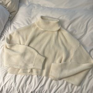Cropped cream turtleneck sweater